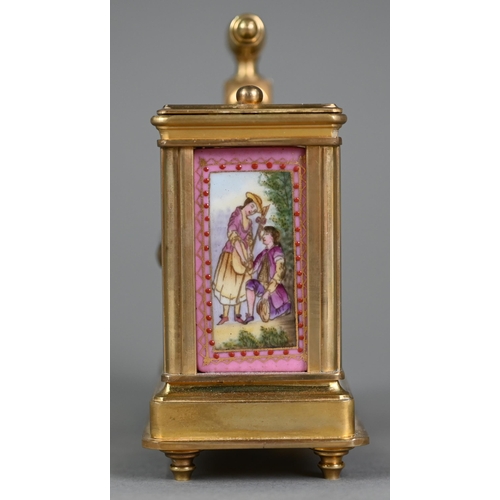 897 - A traditional French lacquered brass carriage clock and barometer pair, with transfer printed pink p... 