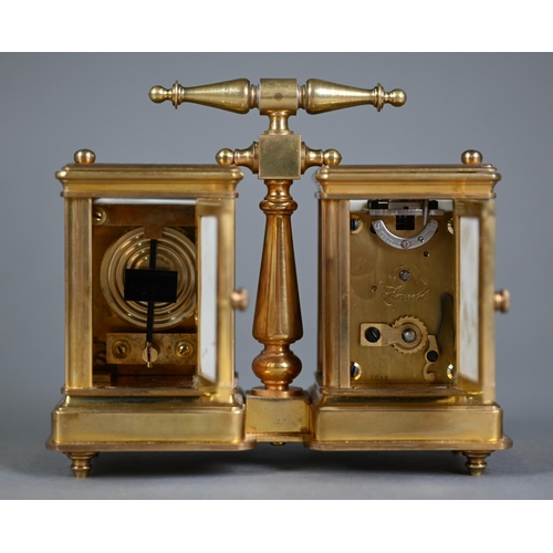 897 - A traditional French lacquered brass carriage clock and barometer pair, with transfer printed pink p... 