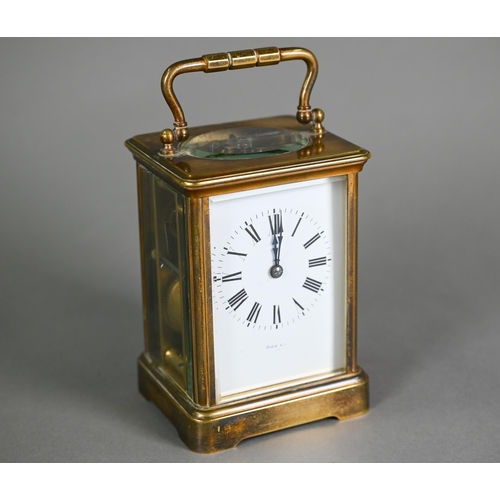 899 - Maple & Co, a lacquered brass French 8-day carriage clock, striking the hours on a coiled gong, ... 