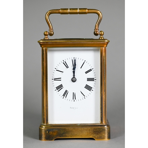 899 - Maple & Co, a lacquered brass French 8-day carriage clock, striking the hours on a coiled gong, ... 