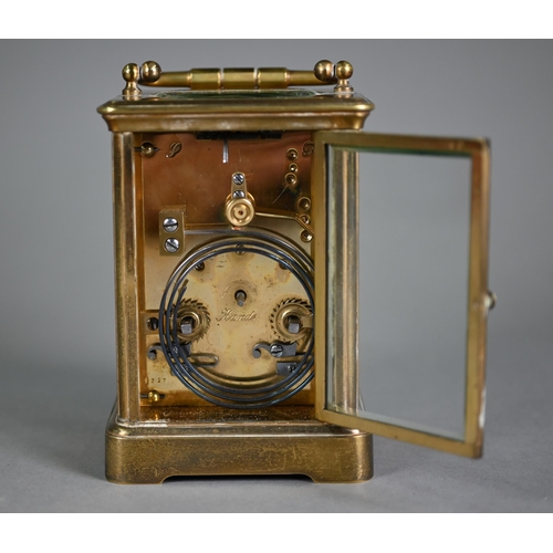 899 - Maple & Co, a lacquered brass French 8-day carriage clock, striking the hours on a coiled gong, ... 