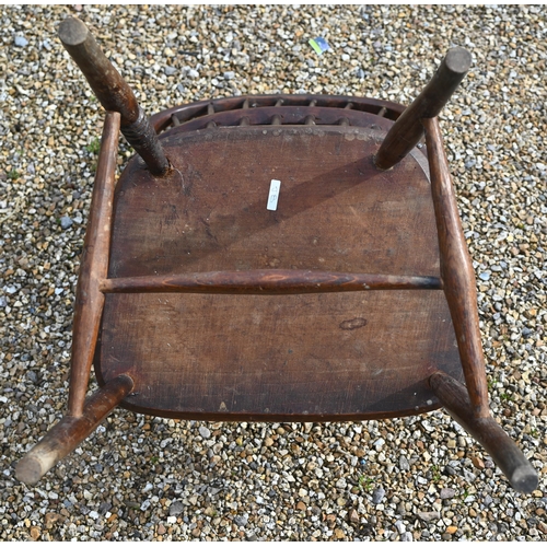 905 - An antique elm seat hoop and stick-back Windsor chair, raised on turned legs and stretchers