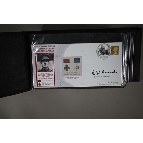 911 - An album containing thirty-three postal covers issued by The Victoria Cross and George Cross Memoria... 