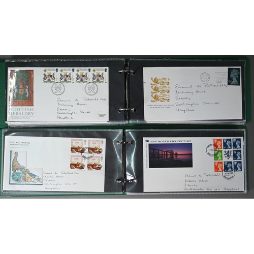 912 - A collection of approximately two hundred and fifty commemorative stamps and first day covers, in ni... 