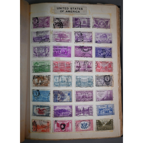 921 - Four albums of Victorian and later British Empire and foreign postage stamps, to/w a tin of loose st... 