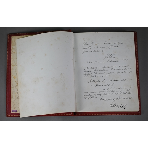 925 - A German gilt-tooled red Morocco leather visitors' book, Seville 1938 - 1943, signed and inscribed b... 