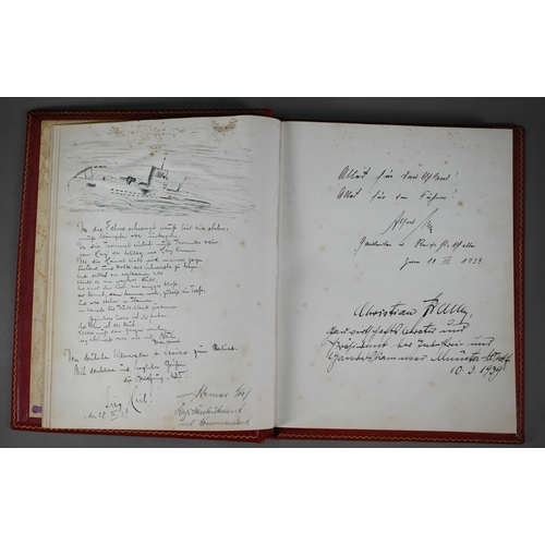 925 - A German gilt-tooled red Morocco leather visitors' book, Seville 1938 - 1943, signed and inscribed b... 