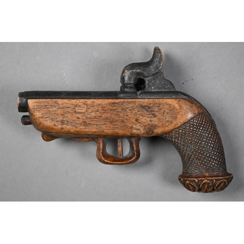 963 - An antique novelty carved wood snuff box in the form of a double-barrelled pistol, to/w three papier... 