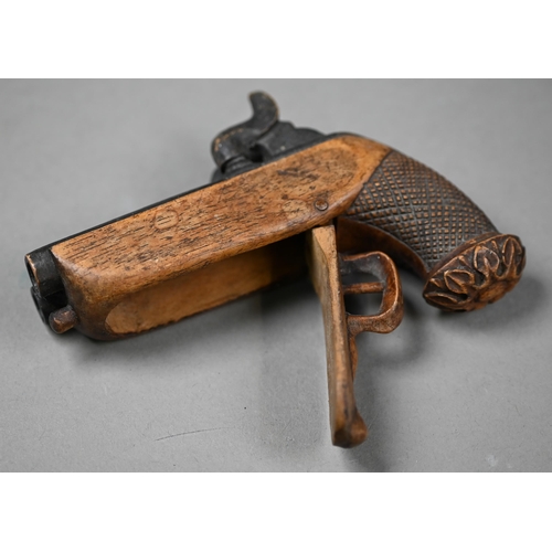 963 - An antique novelty carved wood snuff box in the form of a double-barrelled pistol, to/w three papier... 