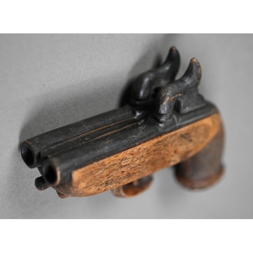 963 - An antique novelty carved wood snuff box in the form of a double-barrelled pistol, to/w three papier... 