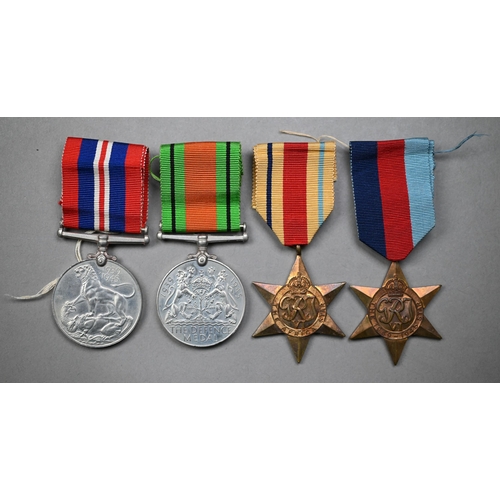 971 - WWII service medals comprising 1939-45 Star; Africa Star; Defence and 1939-45 war medals c/with conf... 