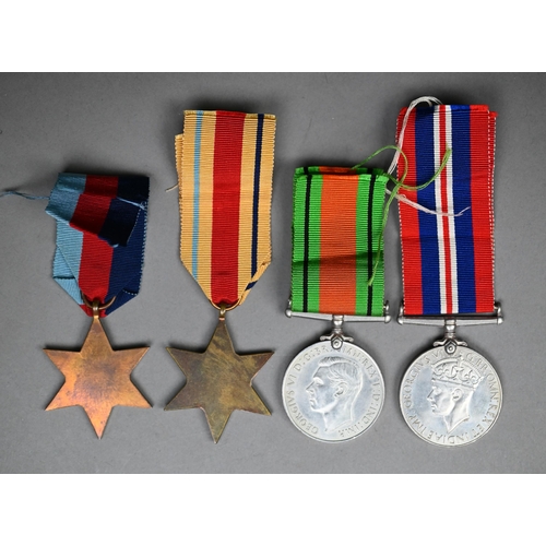 971 - WWII service medals comprising 1939-45 Star; Africa Star; Defence and 1939-45 war medals c/with conf... 