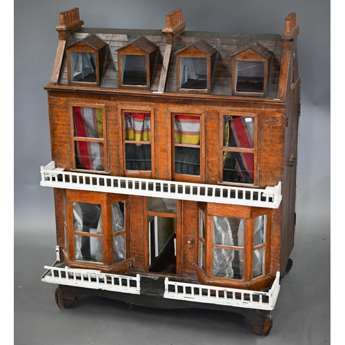 977 - A large late Victorian three-storey villa doll's house with double-bay front, 119 cm high x 100 cm w... 