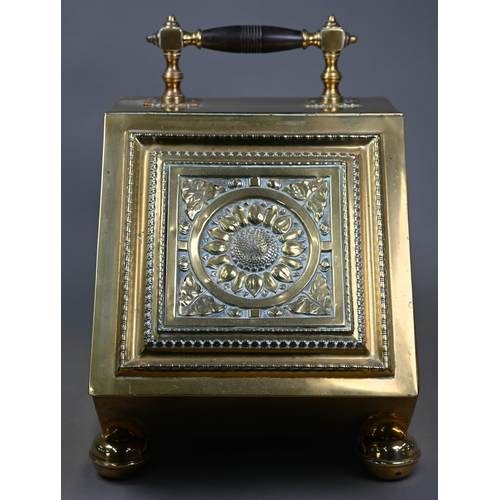 979 - An Arts & Crafts brass coal scuttle in the manner of Benson/Dresser, with turned wood handle and... 