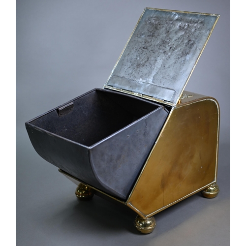 979 - An Arts & Crafts brass coal scuttle in the manner of Benson/Dresser, with turned wood handle and... 