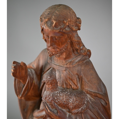 984 - An antique carved wood figure of Christ with lamb, 61 cm, to/w a Greek icon with embossed front stam... 