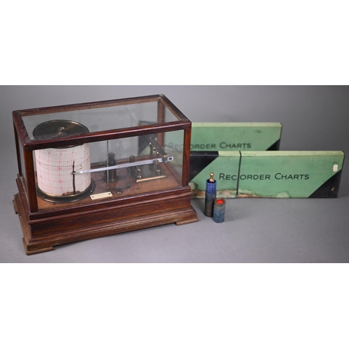 992 - A vintage barograph in glazed oak case, 32 cm wide, to/w two boxes of spare charts and a bottle of i... 