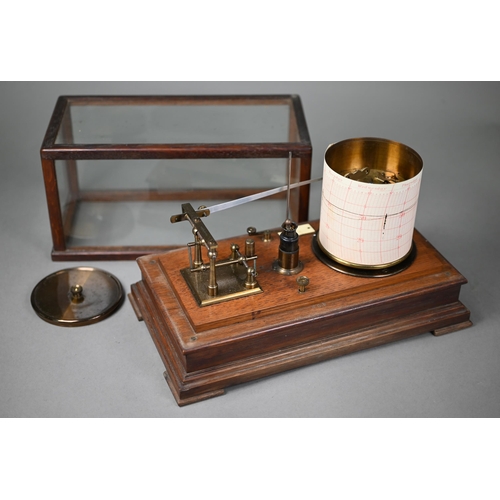 992 - A vintage barograph in glazed oak case, 32 cm wide, to/w two boxes of spare charts and a bottle of i... 