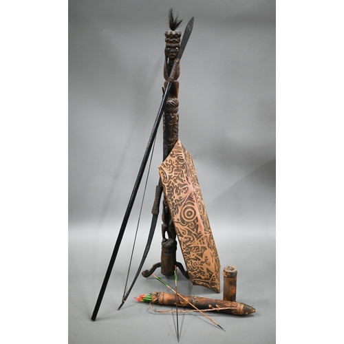 993 - A Penan tribal spear/blowpipe c/w a quiver of bamboo darts, to/w a bow with a quiver of arrows, a ca... 