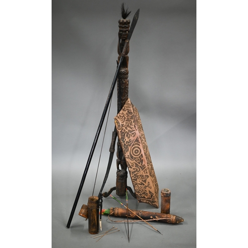 993 - A Penan tribal spear/blowpipe c/w a quiver of bamboo darts, to/w a bow with a quiver of arrows, a ca... 