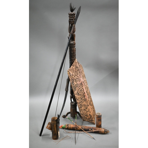 993 - A Penan tribal spear/blowpipe c/w a quiver of bamboo darts, to/w a bow with a quiver of arrows, a ca... 