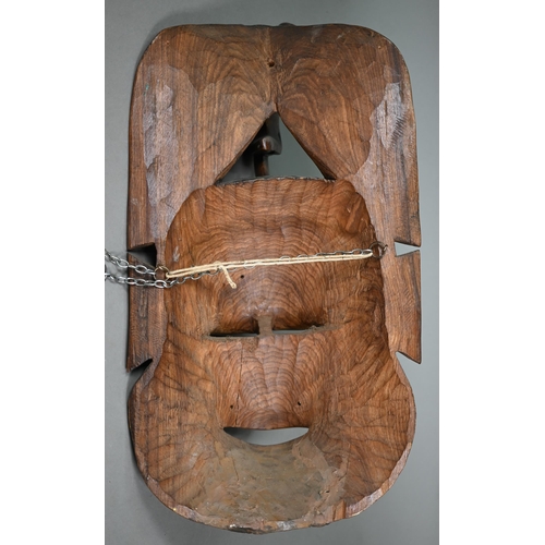 996 - An African tribal mask with bone inlays, surmounted by elephant head-piece, 56 cm high, to/w an Asha... 