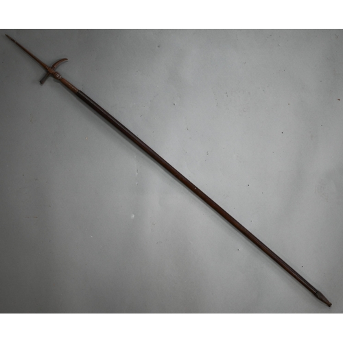 997 - A vintage Indian Mahout's ankusha (elephant goad) with steel top and wooden shaft, 140 cm long