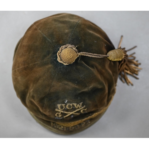 1023A - Three antique green velvet golf club caps with gilt trim and bullion tassels, embroidered U.C.W.G.C.... 