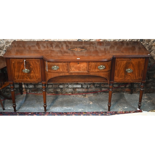 817 - An inlaid Regency inlaid mahogany sideboard, centred by a bow-fronted drawer over a recessed arched ... 