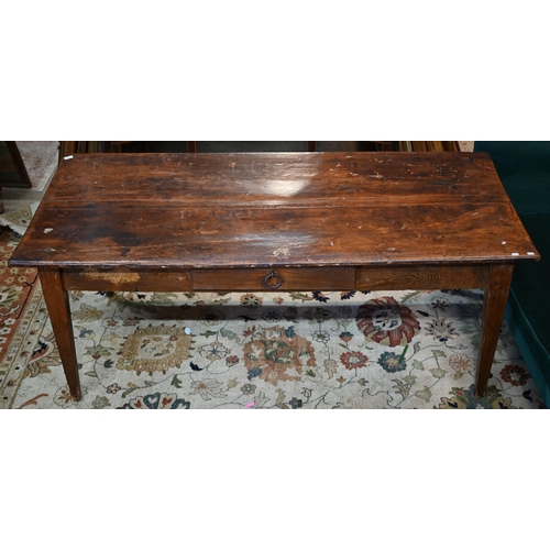 844 - An antique Italian provincial fruitwood farmhouse table, with frieze drawer to one side, raised on s... 