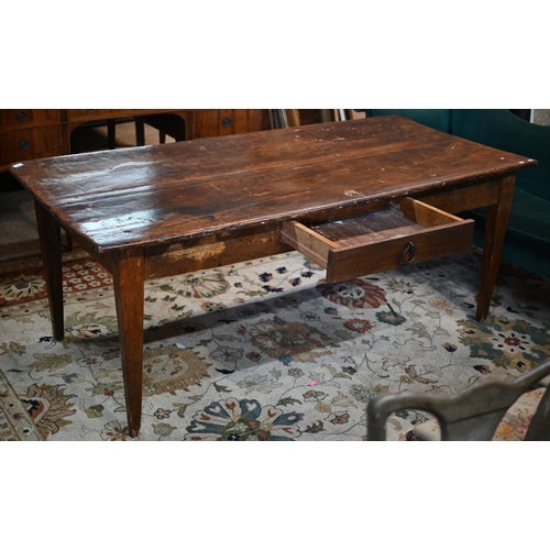 844 - An antique Italian provincial fruitwood farmhouse table, with frieze drawer to one side, raised on s... 