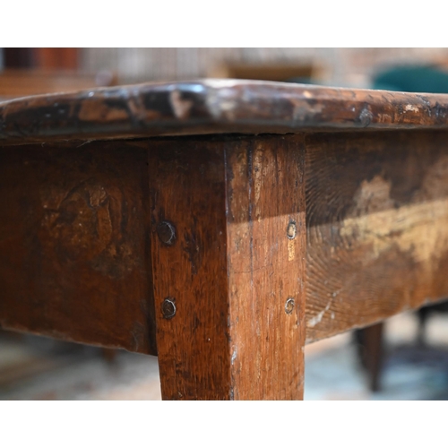 844 - An antique Italian provincial fruitwood farmhouse table, with frieze drawer to one side, raised on s... 