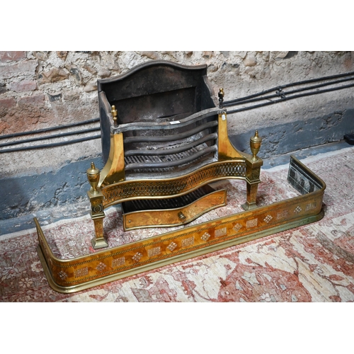 882 - A large George III style brass and cast iron fire grate, of serpentine form, 77 cm w x 66 cm h o/all... 