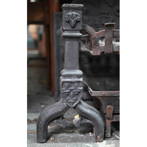 883 - A substantial 17th century style cast iron fire back to/w conforming fire dogs and grate, wooden bel... 