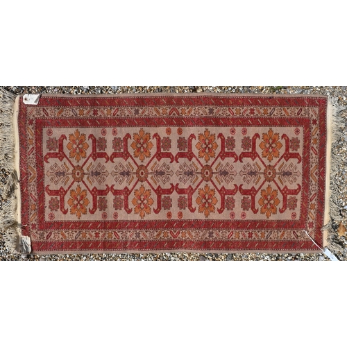 768 - A contemporary Shirvan rug, the pole design on camel ground, 130 cm x 63 cm