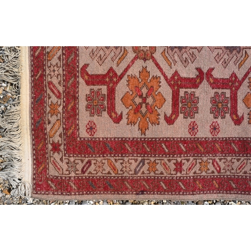 768 - A contemporary Shirvan rug, the pole design on camel ground, 130 cm x 63 cm