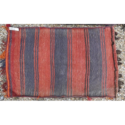 766 - Two mid-century Afghan/Belouch carpet faced saddle bags, with kelim backs, 99 cm x 68 cm and 111 cm ... 