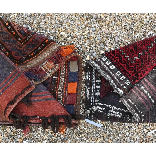 766 - Two mid-century Afghan/Belouch carpet faced saddle bags, with kelim backs, 99 cm x 68 cm and 111 cm ... 