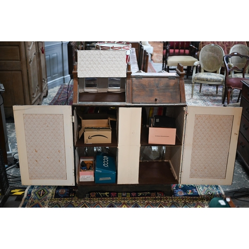 977 - A large late Victorian three-storey villa doll's house with double-bay front, 119 cm high x 100 cm w... 