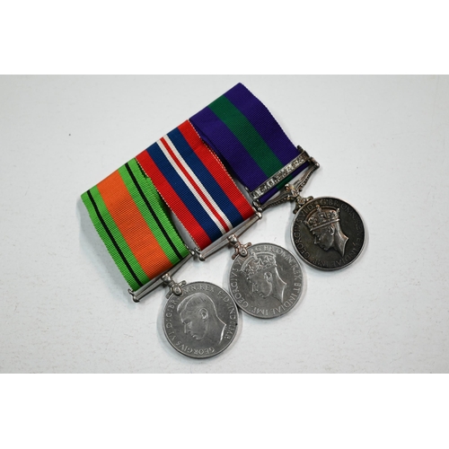 970A - A WWII / S.E Asia trio to Flight Lt. G. E. Davies, RAF comprising a Defence Medal; 1939-45 war Medal... 