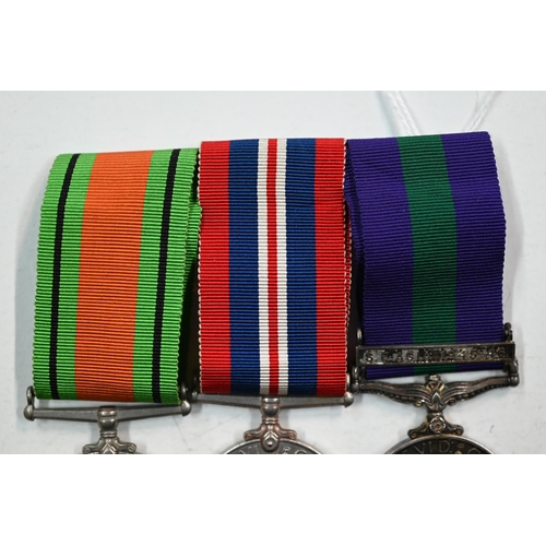 970A - A WWII / S.E Asia trio to Flight Lt. G. E. Davies, RAF comprising a Defence Medal; 1939-45 war Medal... 