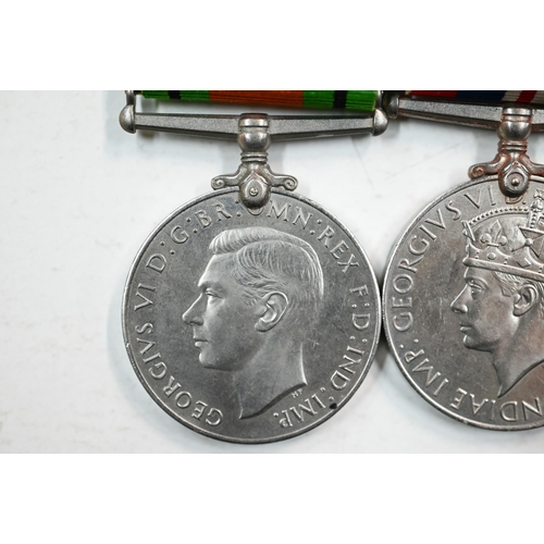 970A - A WWII / S.E Asia trio to Flight Lt. G. E. Davies, RAF comprising a Defence Medal; 1939-45 war Medal... 