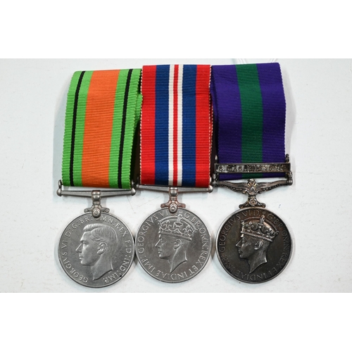 970A - A WWII / S.E Asia trio to Flight Lt. G. E. Davies, RAF comprising a Defence Medal; 1939-45 war Medal... 