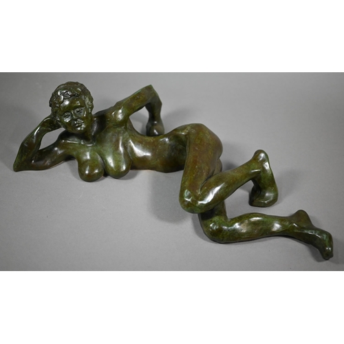 909 - Charlotte Jackson - A verdigris patinated bronze of a reclining nude woman, 49 cm long