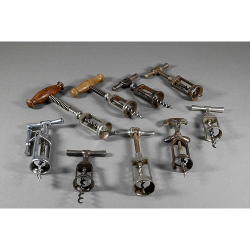 955 - Four Victorian corkscrews with turned wood handles, to/w three 19th century metal corkscrews and a s... 