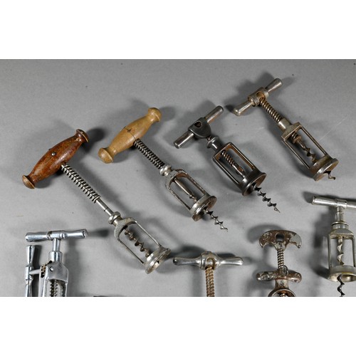 955 - Four Victorian corkscrews with turned wood handles, to/w three 19th century metal corkscrews and a s... 