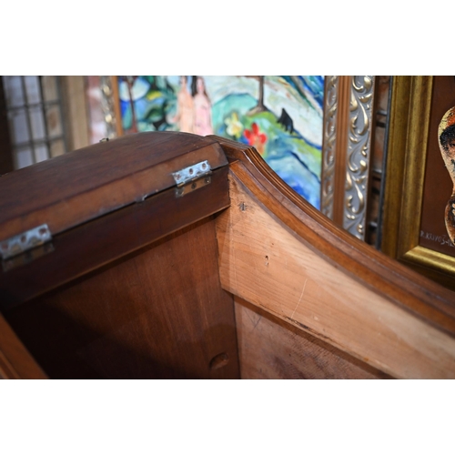 821 - A companion pair of mahogany dressing tables, of concave outline, one with a mirrored back over an a... 