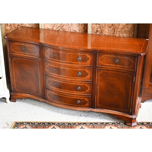 160 - #Brights of Nettlebed, a Victorian style serpentine front cross-banded bright mahogany sideboard, ce... 