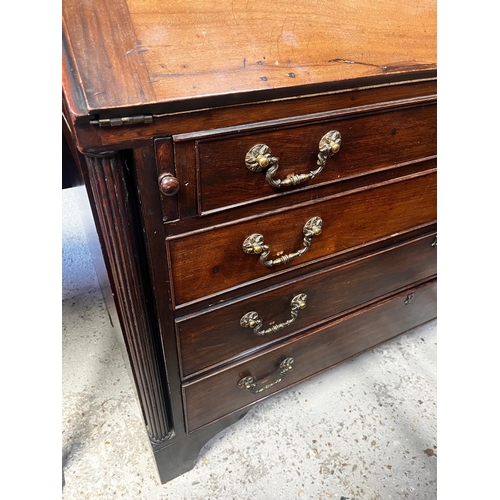 166 - A George III mahogany bureau, the slope enclosing a part fitted interior and tooled green leather su... 