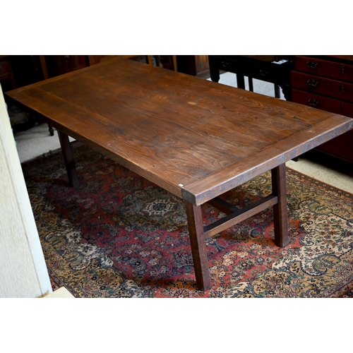 224 - # A substantial elm and oak dining table with cleated rectangular top on square supports united by s... 